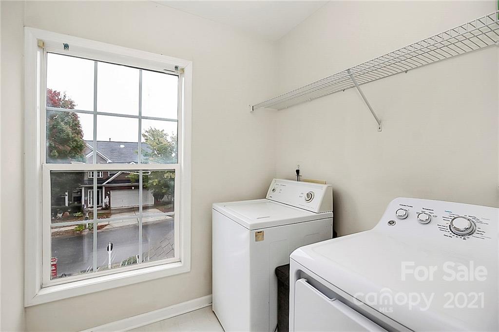 11516 Erwin Ridge Avenue Charlotte, NC 28213 - Photo 29 of 38 a utility room with dryer and washer