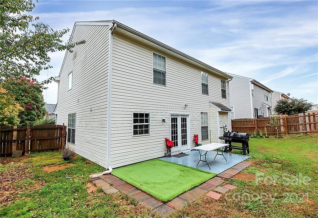 11516 Erwin Ridge Avenue Charlotte, NC 28213 - Photo 32 of 38 a view of a backyard with a patio
