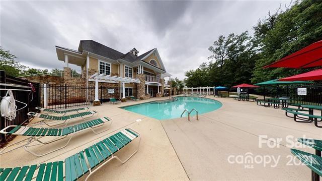 11516 Erwin Ridge Avenue Charlotte, NC 28213 - Photo 36 of 38 a view of a house with swimming pool and sitting area