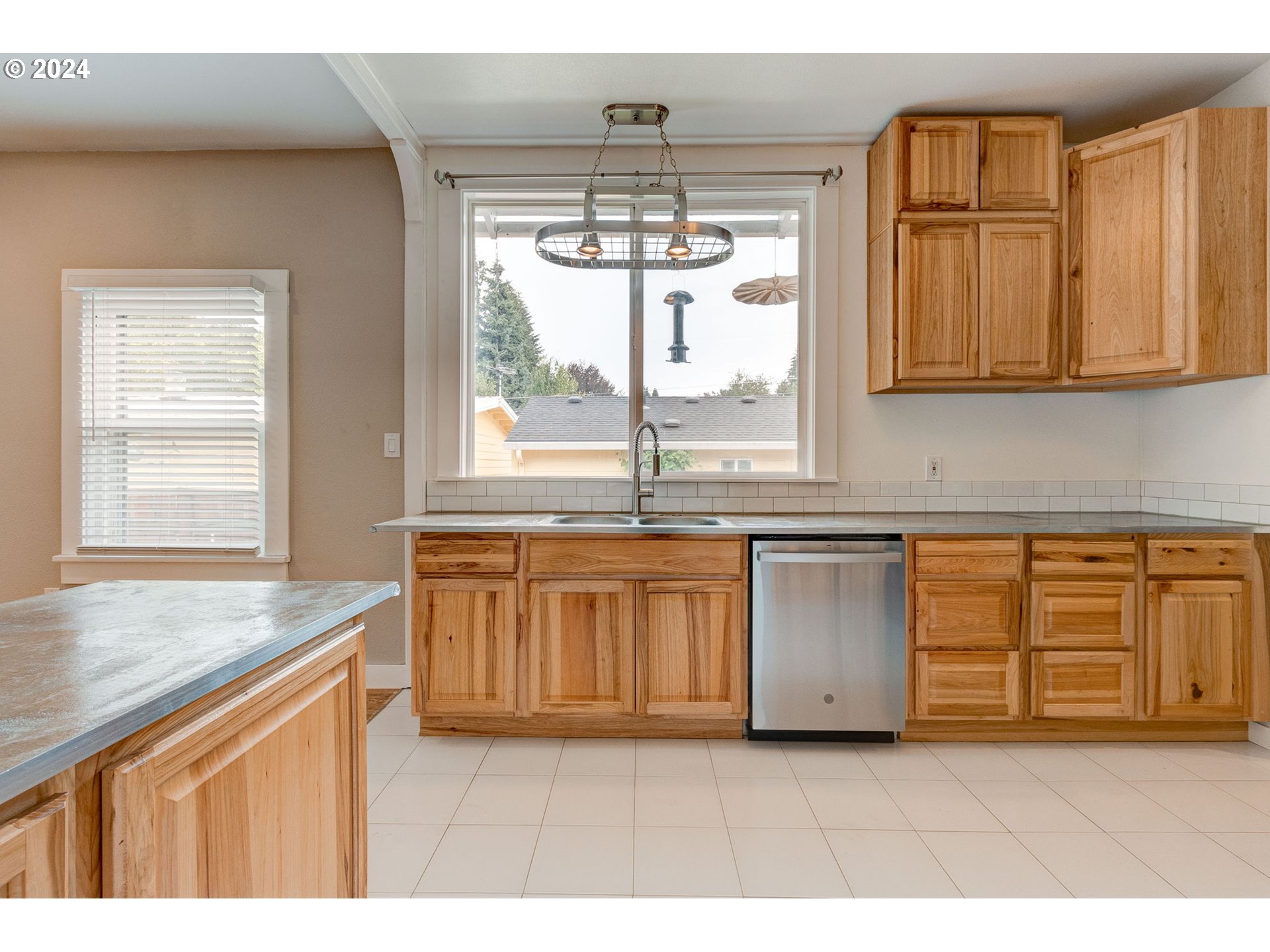 120 North 4th Avenue Ridgefield, WA 98642 - Photo 8 of 33 a kitchen with stainless steel appliances granite countertop a stove a sink and a granite counter tops