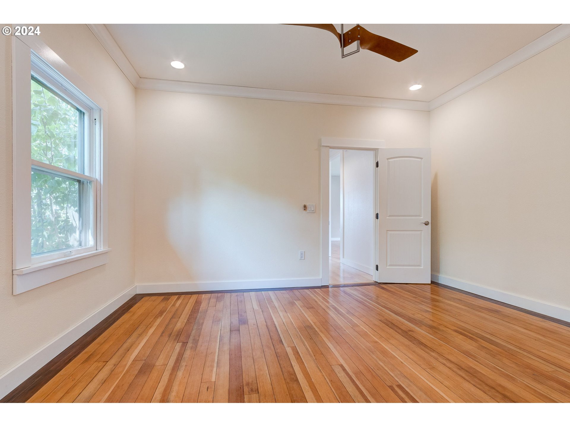 120 North 4th Avenue Ridgefield, WA 98642 - Photo 9 of 33 wooden floor in an empty room with a window