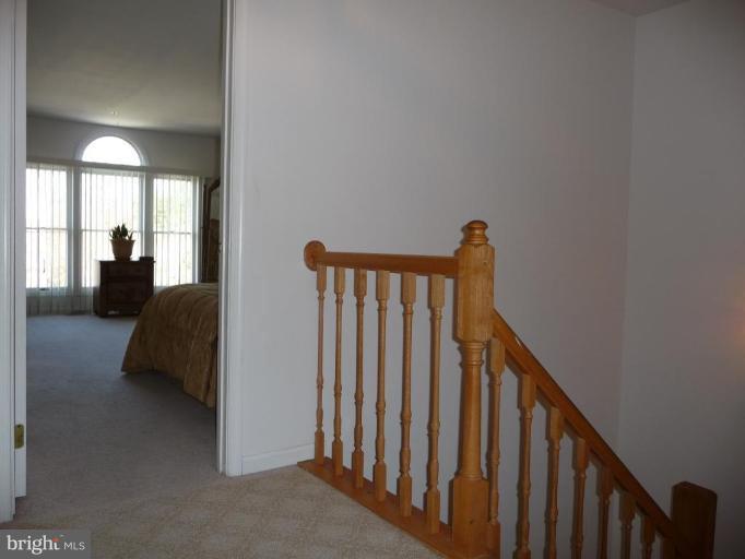 12120 Apache Tears Circle Laurel, MD 20708 - Photo 12 of 30 a view of entryway and hall with a couch