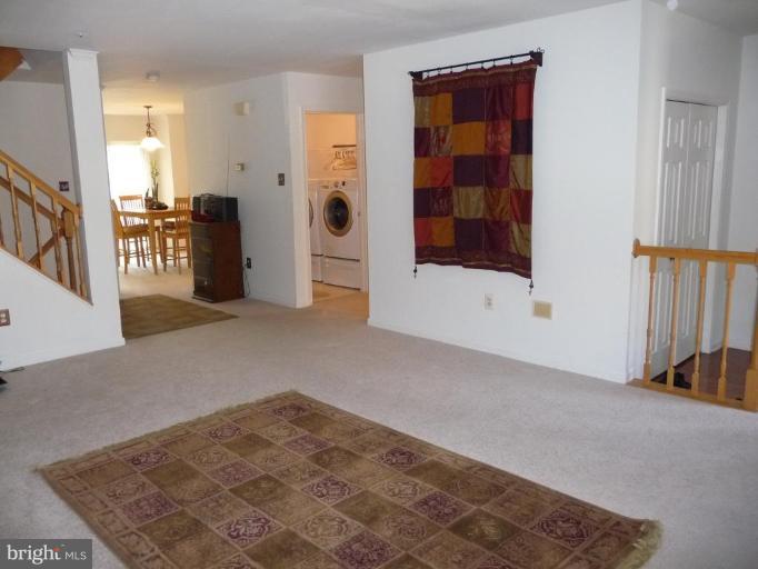 12120 Apache Tears Circle Laurel, MD 20708 - Photo 3 of 30 a view of an empty room with a window