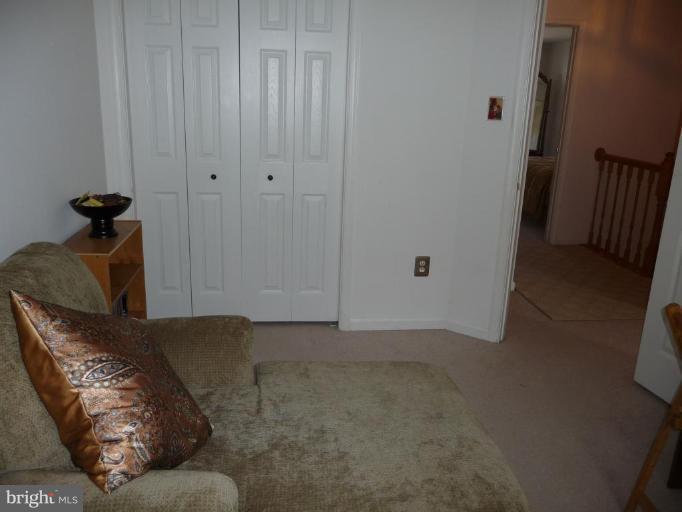 12120 Apache Tears Circle Laurel, MD 20708 - Photo 23 of 30 a living room with furniture