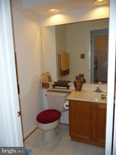 12120 Apache Tears Circle Laurel, MD 20708 - Photo 4 of 30 a bathroom with a sink toilet and shower