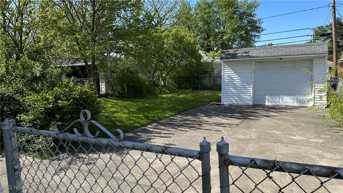 15917 Turney Road Maple Heights, OH 44137 - Photo 2 of 19 Fully fenced in backyard with 1 car detached garage