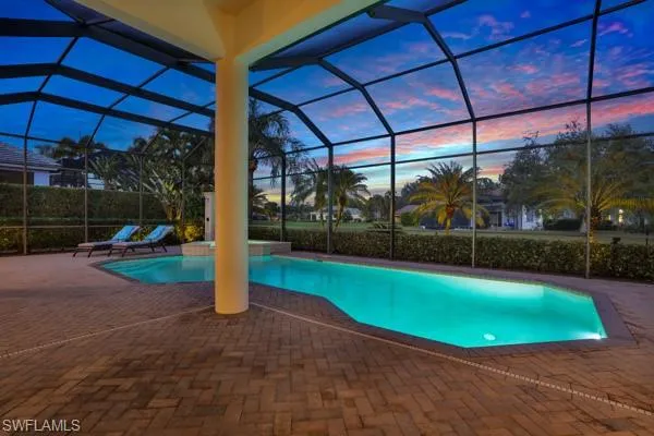 a view of a backyard with patio