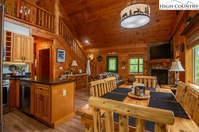 a view of a kitchen with furniture and a window