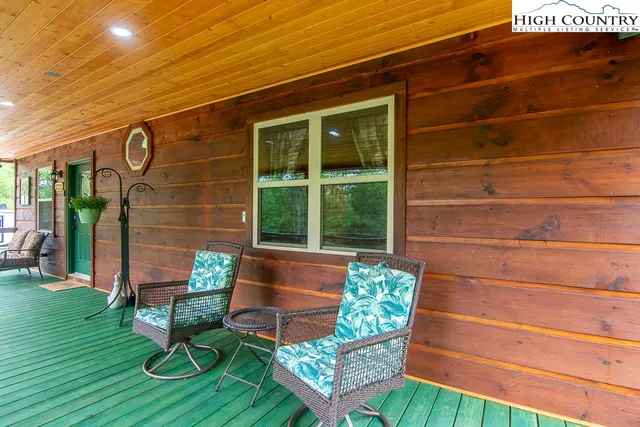 a bench sitting in front of a house