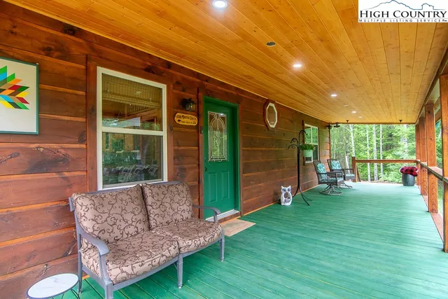 a view of a backyard with garden and plants
