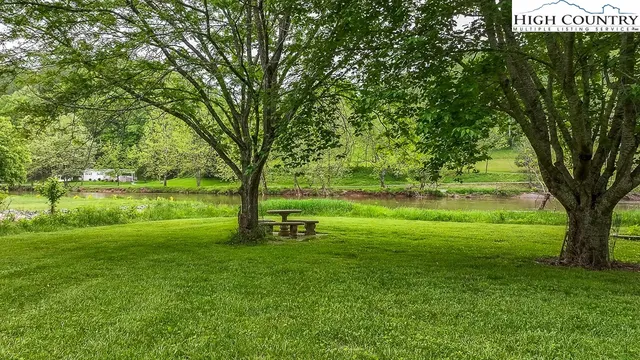a view of outdoor space with deck and garden