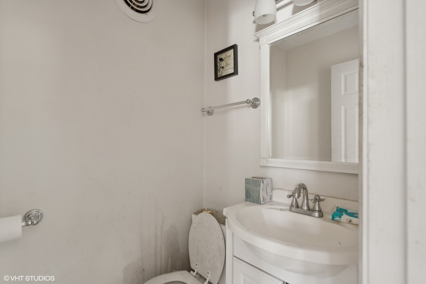 8345 McCarthy Road Palos Park, IL 60464 - Photo 12 of 18 a bathroom with a sink and a toilet