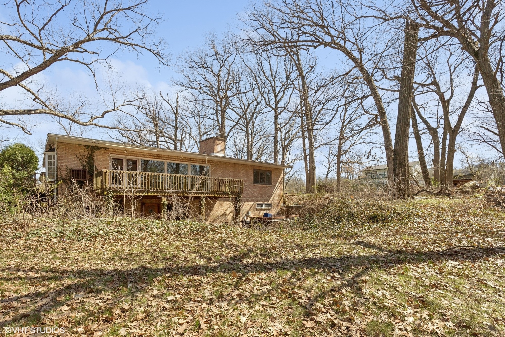 8345 McCarthy Road Palos Park, IL 60464 - Photo 14 of 18 a backyard of a house with large trees and outdoor seating