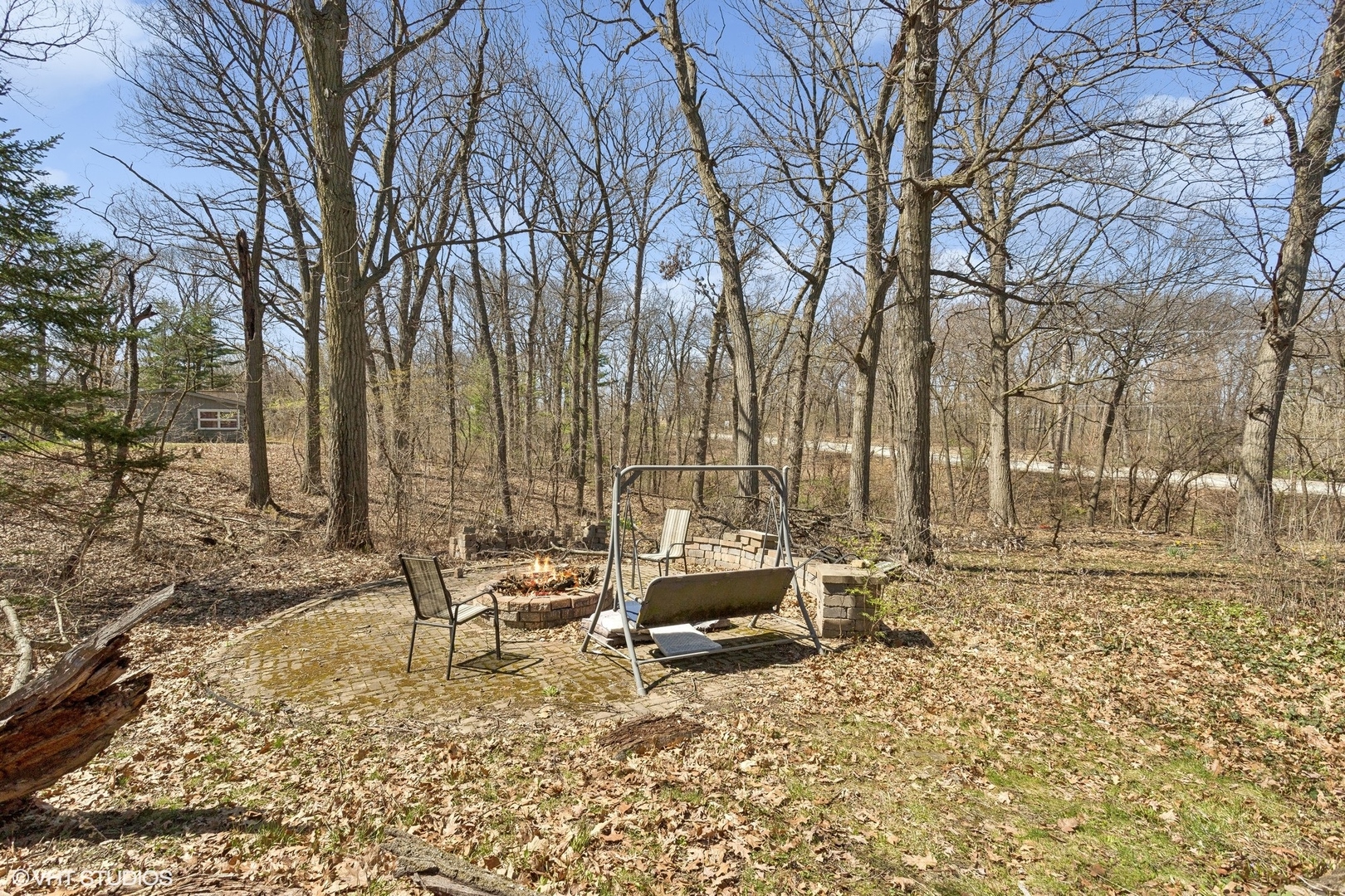 8345 McCarthy Road Palos Park, IL 60464 - Photo 15 of 18 a backyard of a house with table and chairs