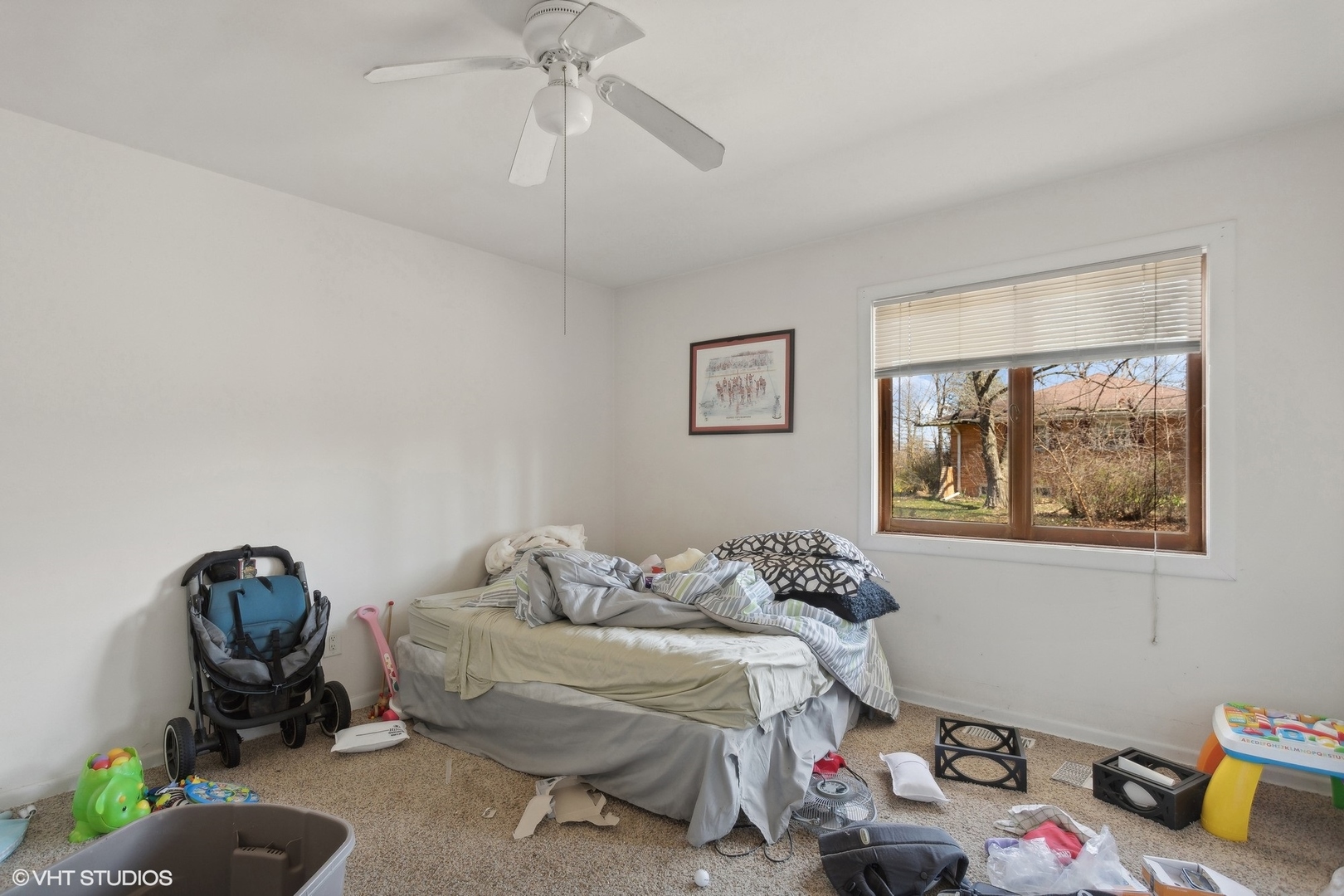 8345 McCarthy Road Palos Park, IL 60464 - Photo 9 of 18 a bedroom with a bed and wooden floor