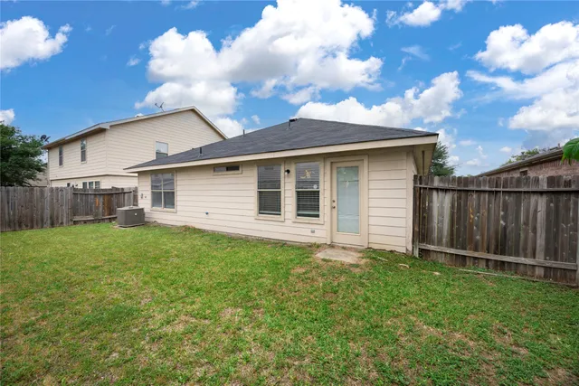a view of a backyard with a garden