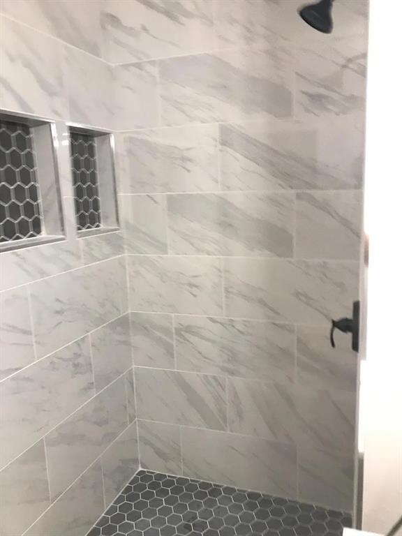 1617 East Union Bower Road Irving, TX 75061 - Photo 9 of 14 a bathroom with a shower