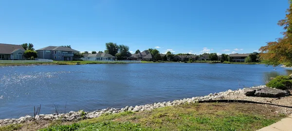 a view of a lake with outdoor space