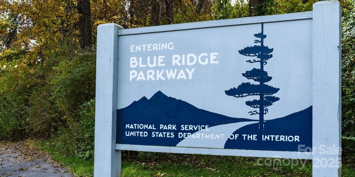 27 Poplar Forest Drive Boone, NC 28607 - Photo 10 of 12 a sign on the side of a building