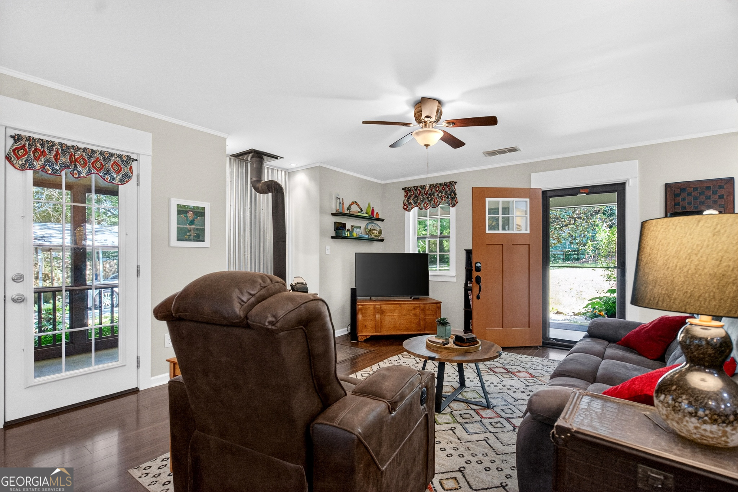 4656 Greenville Road LaGrange, GA 30241 - Photo 6 of 34 a living room with furniture a ceiling fan and a window