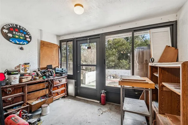 an aerial view of a house with yard swimming pool and outdoor seating