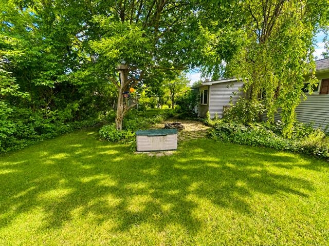 719 Rhodes Street Pinconning, MI 48650 - Photo 3 of 17