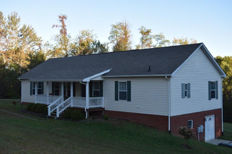 440 Horse Ridge Road Northwest Willis, VA 24380 - Photo 1 of 62 a view of a house with a yard