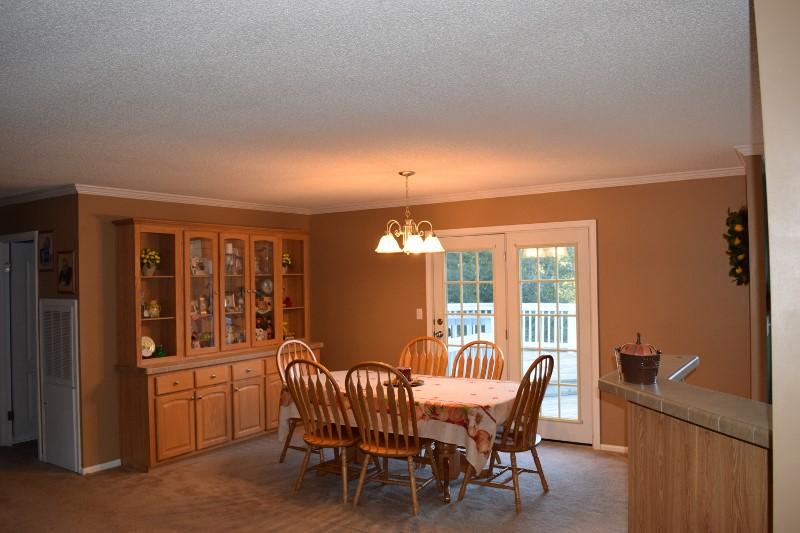 440 Horse Ridge Road Northwest Willis, VA 24380 - Photo 17 of 62 a dining room with furniture and window