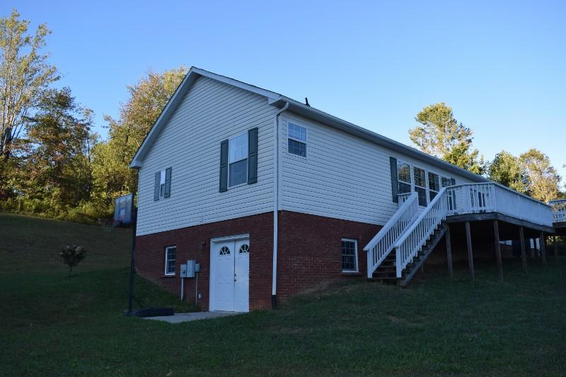 440 Horse Ridge Road Northwest Willis, VA 24380 - Photo 3 of 62 a view of house with backyard