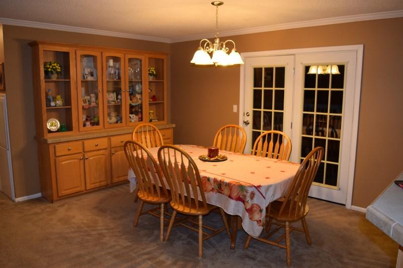 440 Horse Ridge Road Northwest Willis, VA 24380 - Photo 39 of 62 a view of a dining room with furniture window and wooden floor