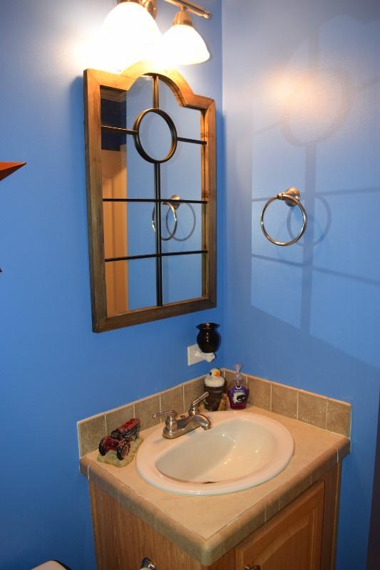 440 Horse Ridge Road Northwest Willis, VA 24380 - Photo 47 of 62 a bathroom with a sink and a mirror