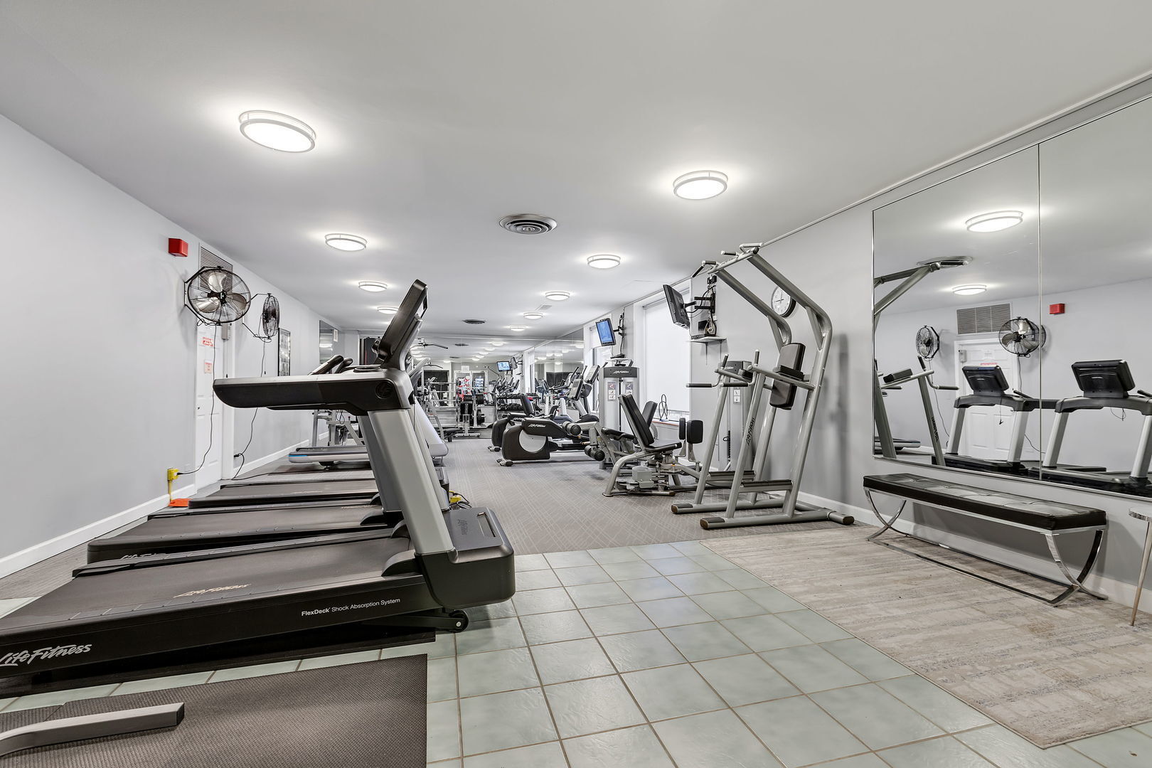 720 West Gordon Terrace, Unit 7F Chicago, IL 60613 - Photo 13 of 15 a view of a room with gym equipment