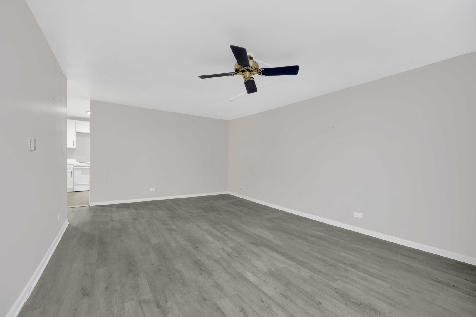 720 West Gordon Terrace, Unit 7F Chicago, IL 60613 - Photo 5 of 15 wooden floor in an empty room