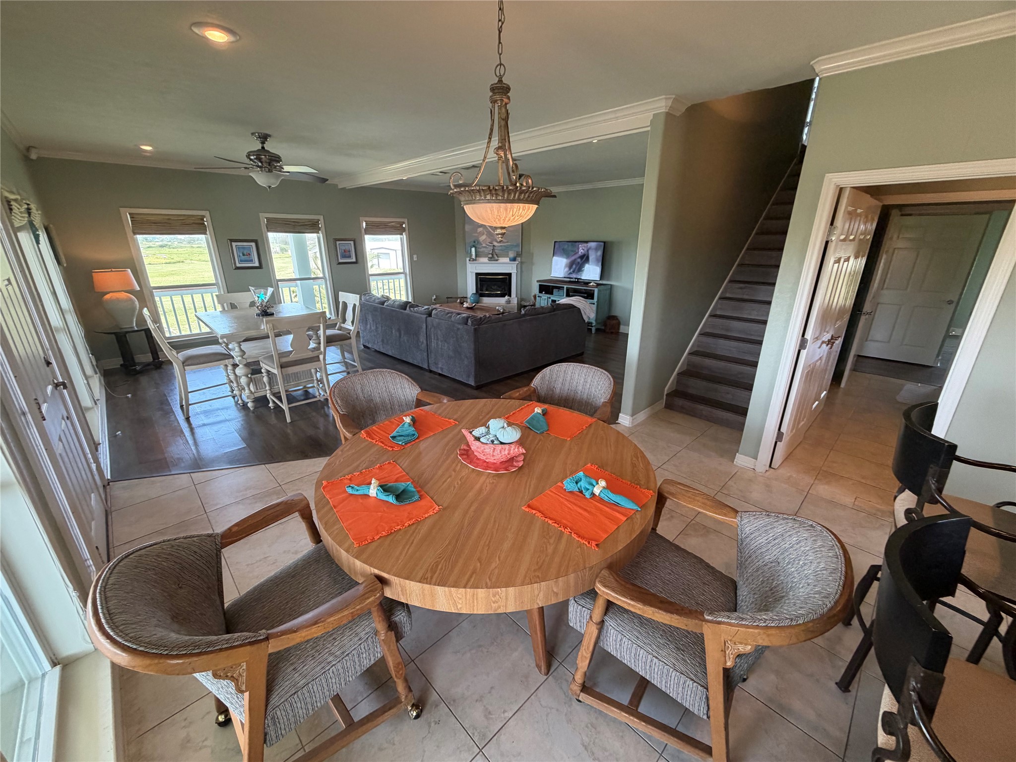 979 Rancho Carribe Drive Crystal Beach, TX 77650 - Photo 25 of 50 View from second dining table back towards the additional dining area and living room