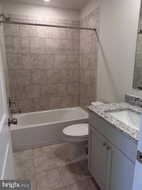 1806 Oxbow Road Baltimore, MD 21244 - Photo 12 of 14 a bathroom with a granite countertop bathtub sink vanity mirror and toilet