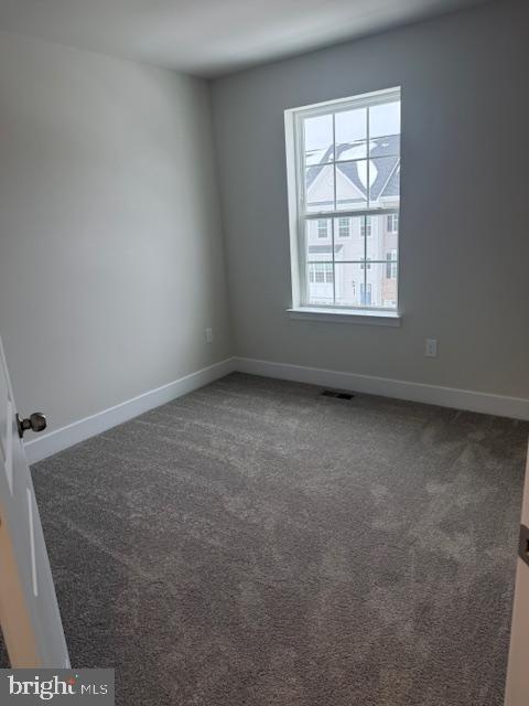 1806 Oxbow Road Baltimore, MD 21244 - Photo 13 of 14 an empty room with a window