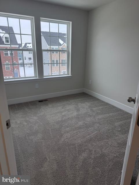 1806 Oxbow Road Baltimore, MD 21244 - Photo 14 of 14 an empty room with a window