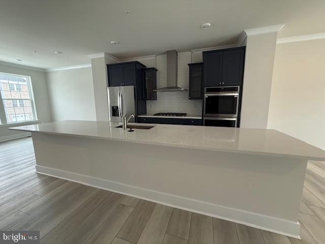 1806 Oxbow Road Baltimore, MD 21244 - Photo 3 of 14 a kitchen with stainless steel appliances a sink and a refrigerator