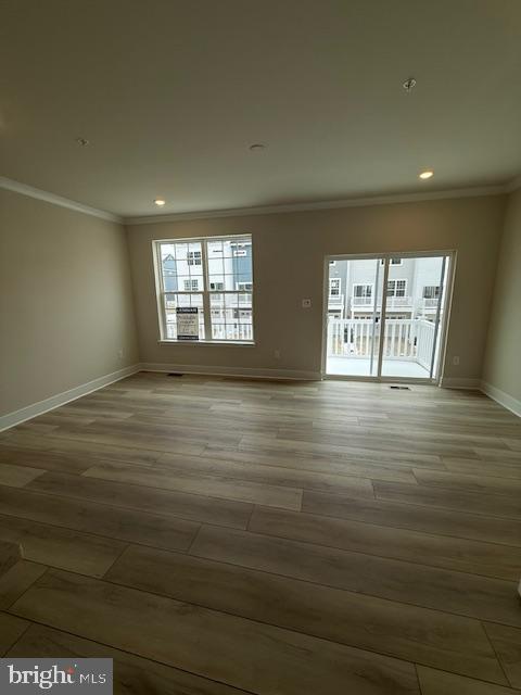 1806 Oxbow Road Baltimore, MD 21244 - Photo 6 of 14 a view of an empty room with a window