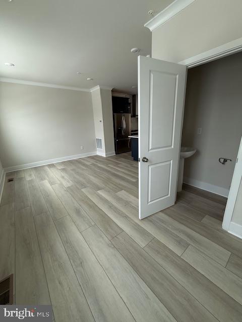 1806 Oxbow Road Baltimore, MD 21244 - Photo 8 of 14 a view of empty room with wooden floor