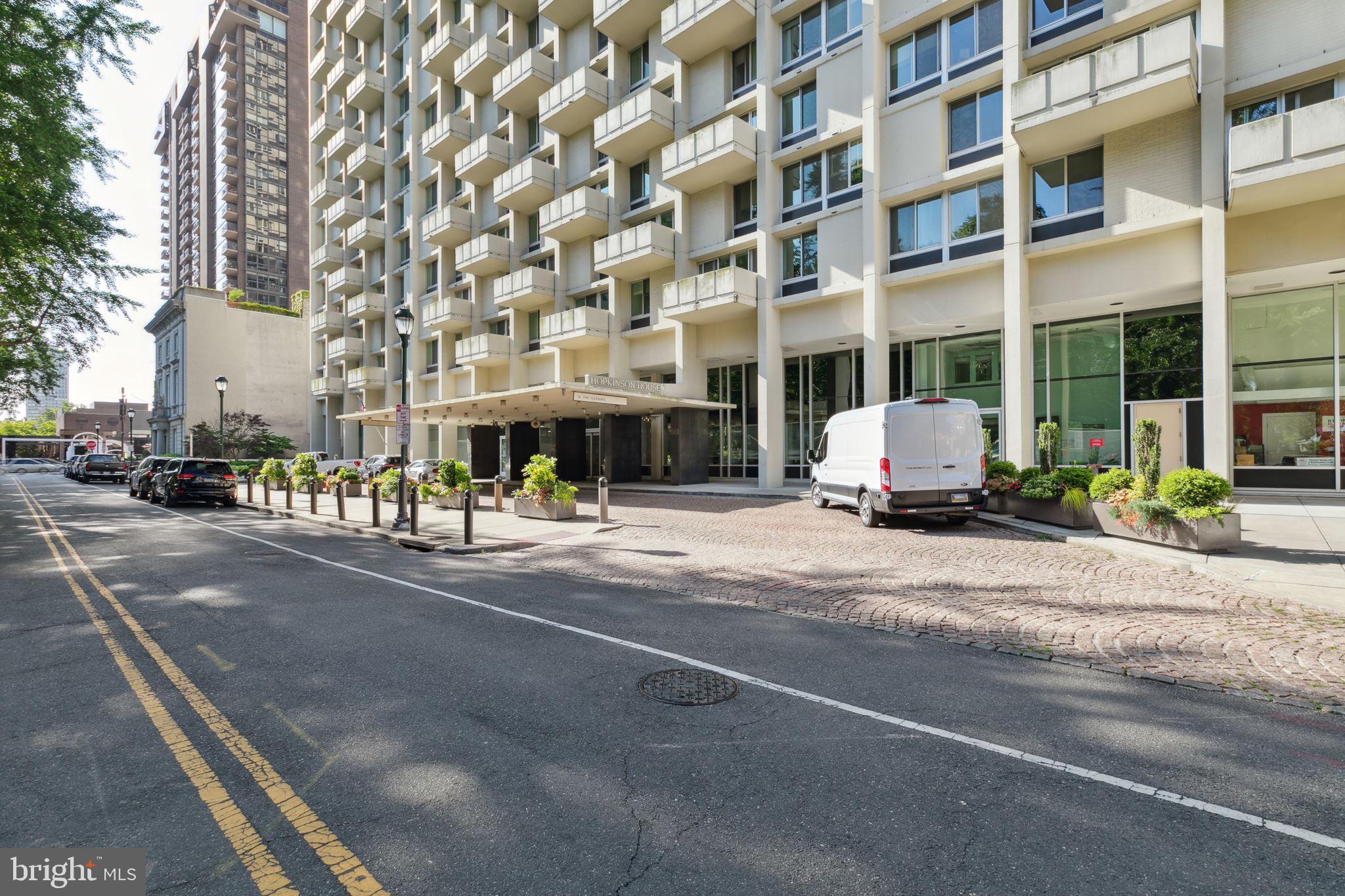 a view of a building with a street