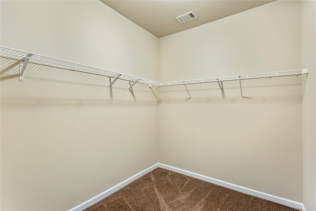 1005 Winmar Drive Anderson, SC 29621 - Photo 24 of 50 This spacious walk-in closet offers ample storage with durable wire shelving.