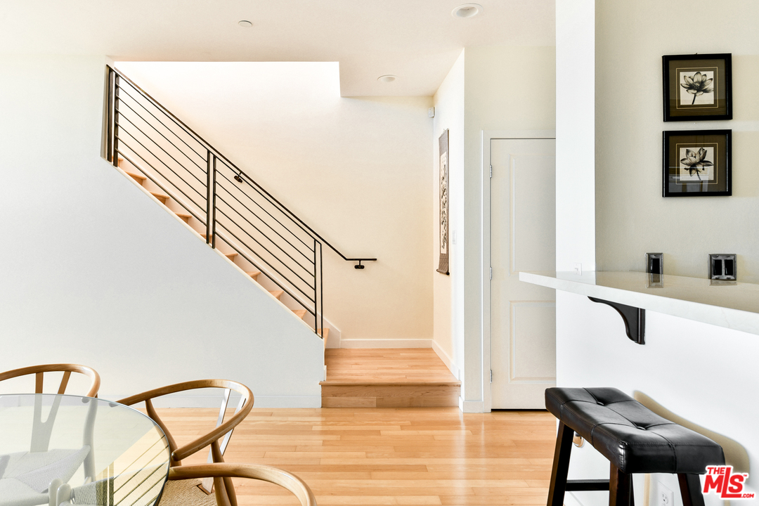 7301 Vista Del Mar, Unit 40 Playa del Rey, CA 90293 - Photo 15 of 29 a view of a hallway to a livingroom with furniture and wooden floor