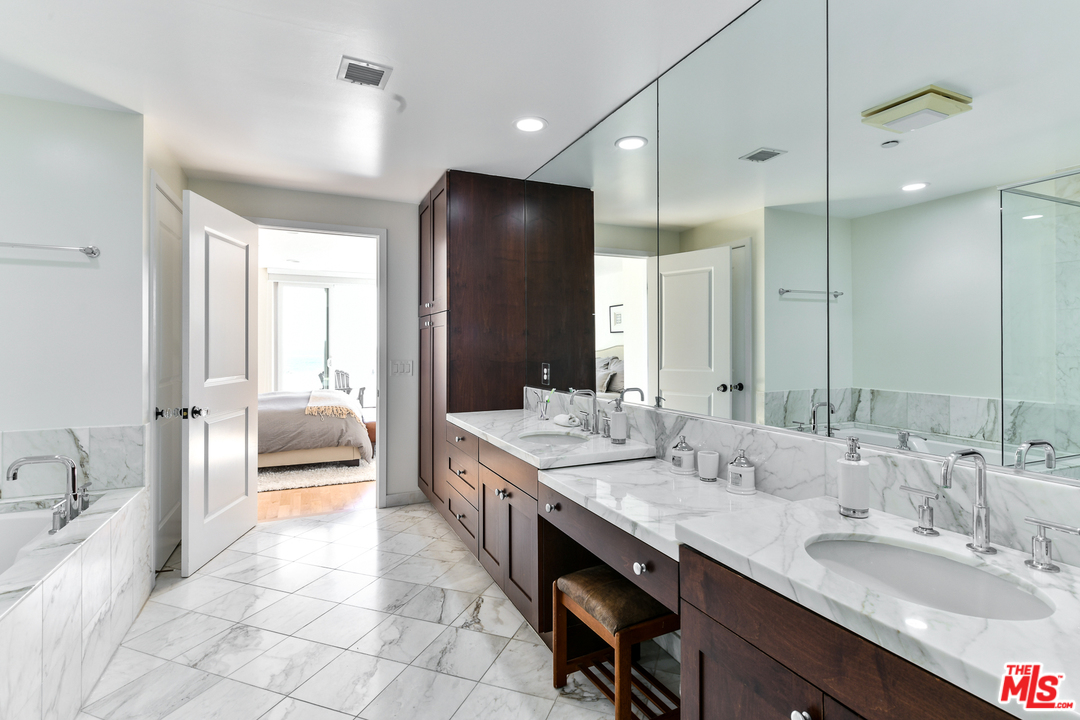 7301 Vista Del Mar, Unit 40 Playa del Rey, CA 90293 - Photo 19 of 29 a spacious bathroom with a tub double sink and mirror