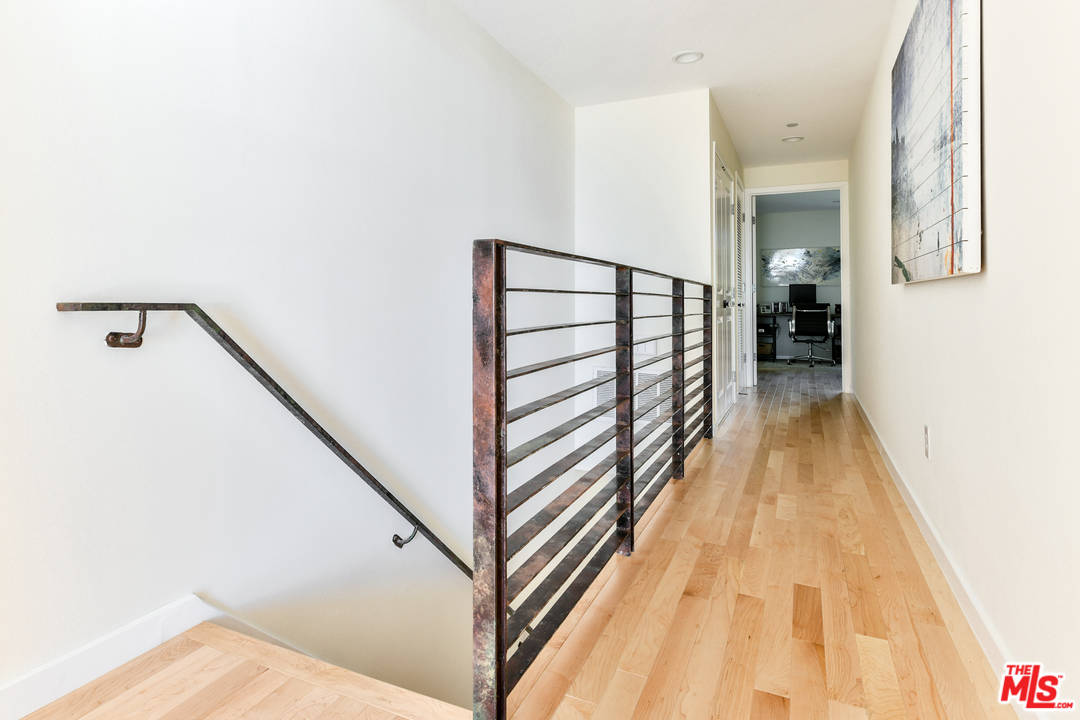7301 Vista Del Mar, Unit 40 Playa del Rey, CA 90293 - Photo 21 of 29 a view of a hallway with wooden floor and staircase
