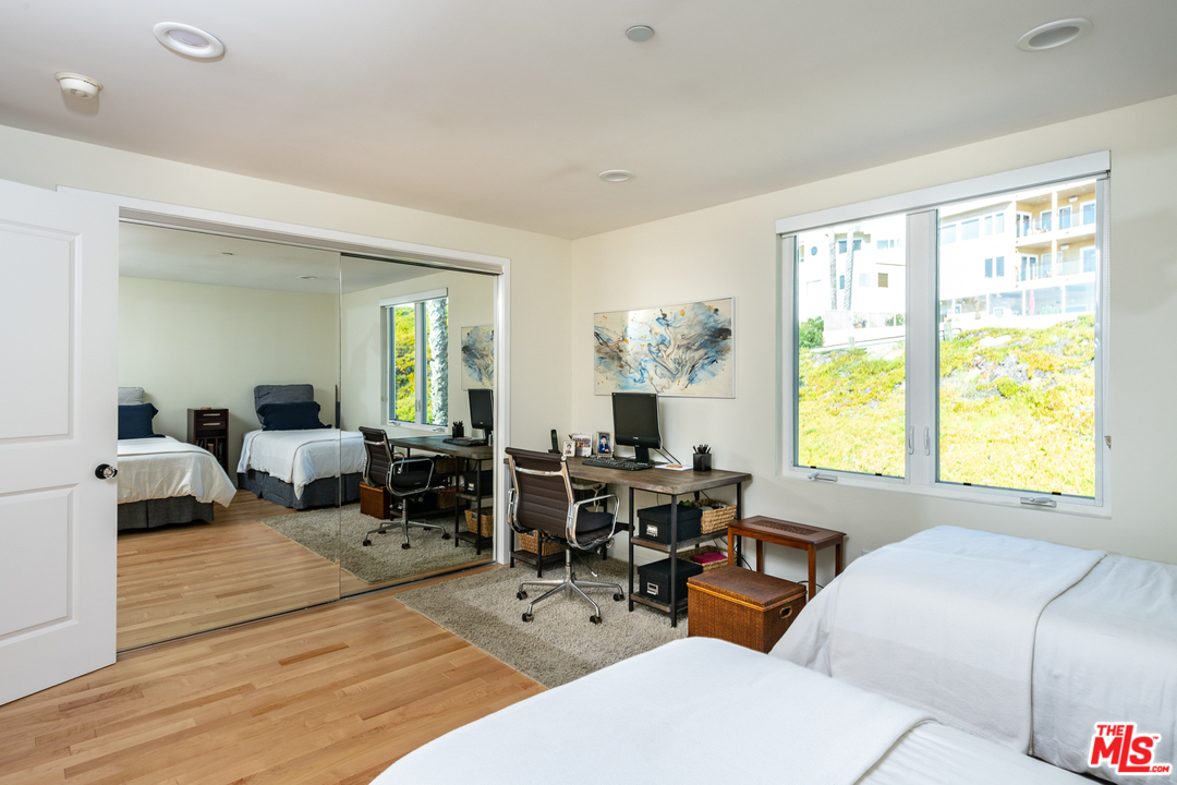 7301 Vista Del Mar, Unit 40 Playa del Rey, CA 90293 - Photo 23 of 29 a living room with furniture and a large window