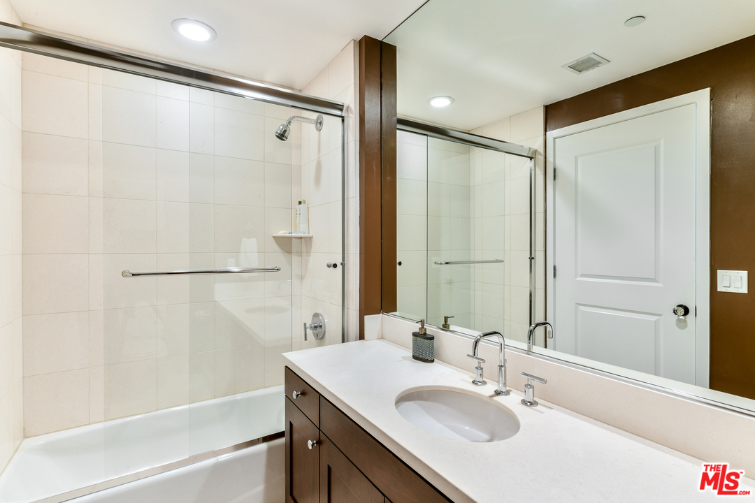 7301 Vista Del Mar, Unit 40 Playa del Rey, CA 90293 - Photo 24 of 29 a bathroom with a sink shower and a mirror