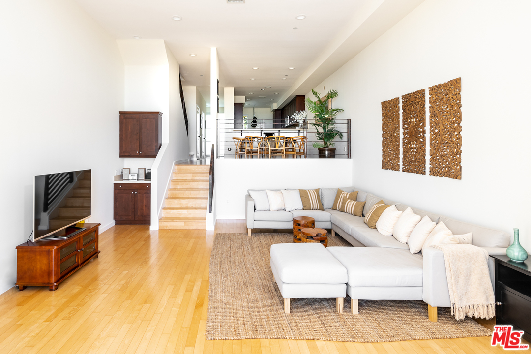 7301 Vista Del Mar, Unit 40 Playa del Rey, CA 90293 - Photo 4 of 29 a living room with furniture and a flat screen tv