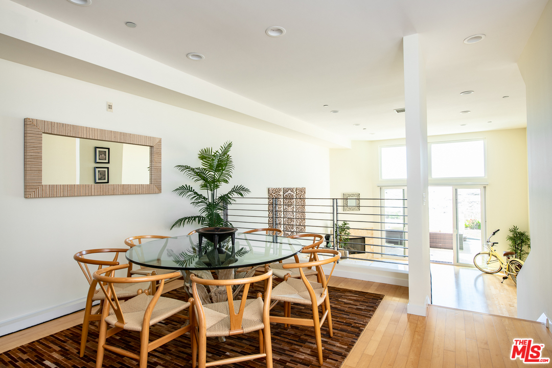 7301 Vista Del Mar, Unit 40 Playa del Rey, CA 90293 - Photo 8 of 29 a dining room with furniture and wooden floor