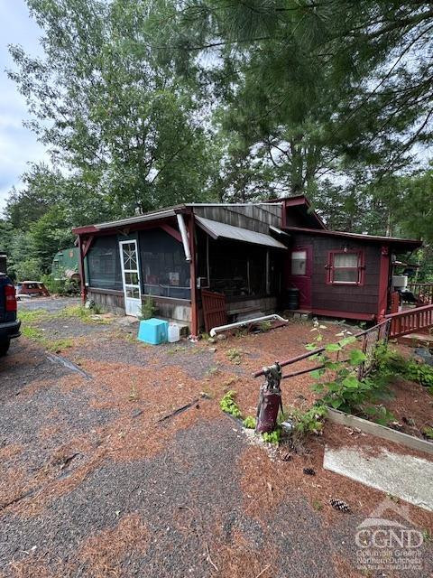 597 Vosenkill Road Catskill, NY 12414 - Photo 14 of 17 a view of a backyard with a patio